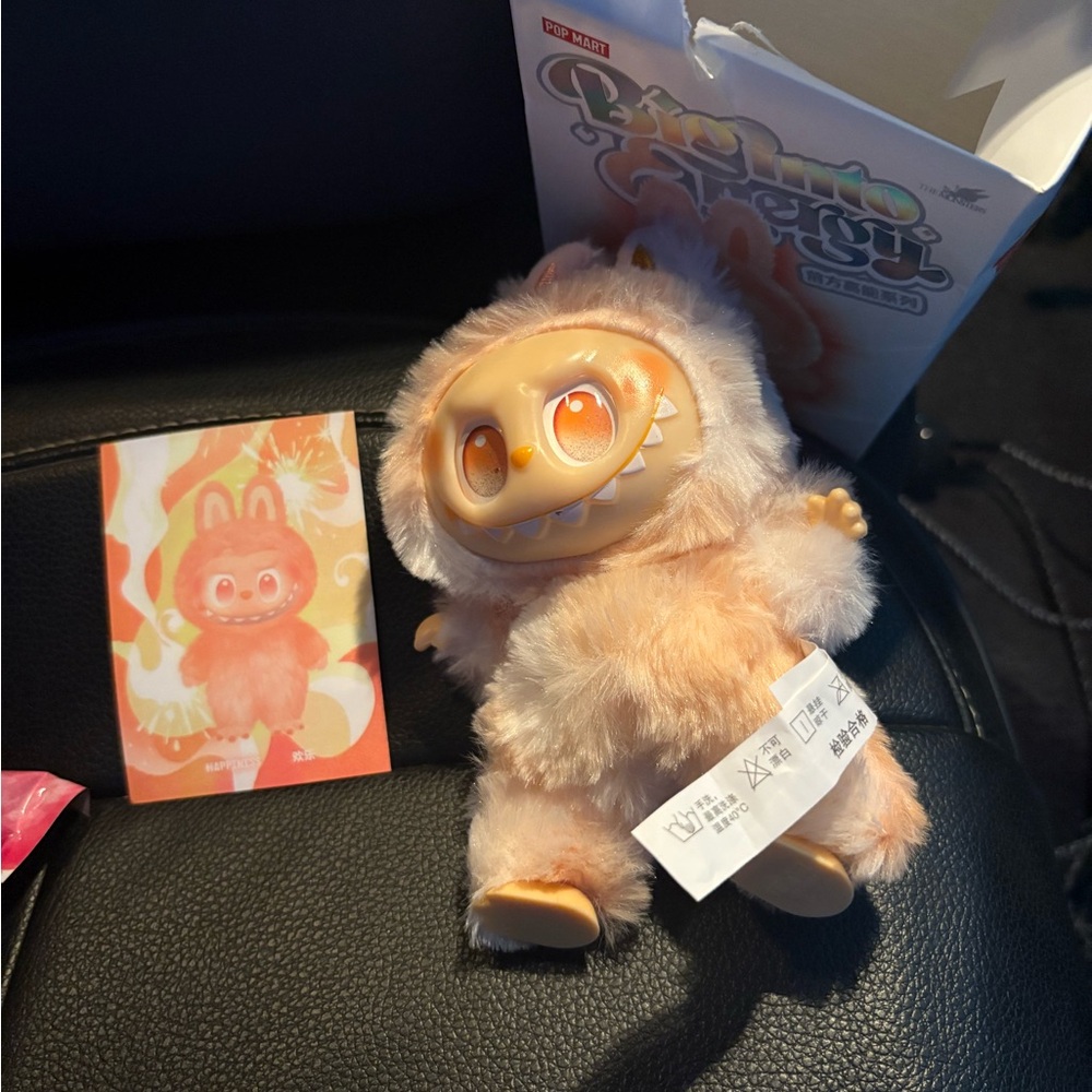 Cream and Orange Plush Toy